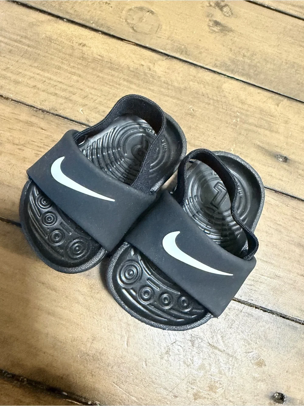 Nike Kids Black Slides with White Swoosh